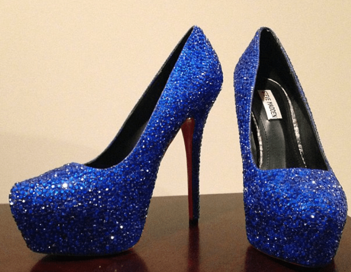 a pair of Christian Louboutin shoes
